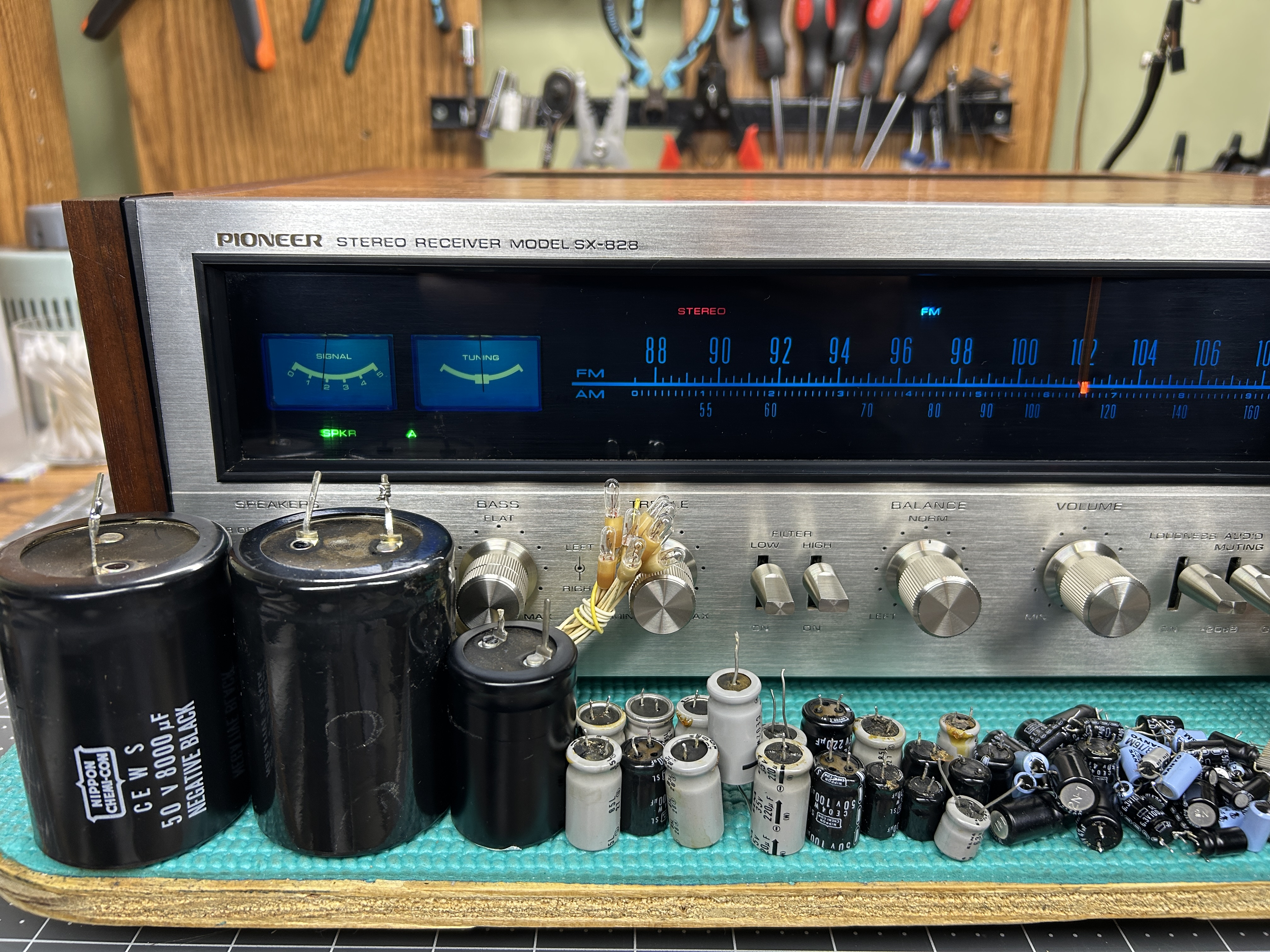Completed Pioneer SX-828 left-side view with restored walnut cabinet